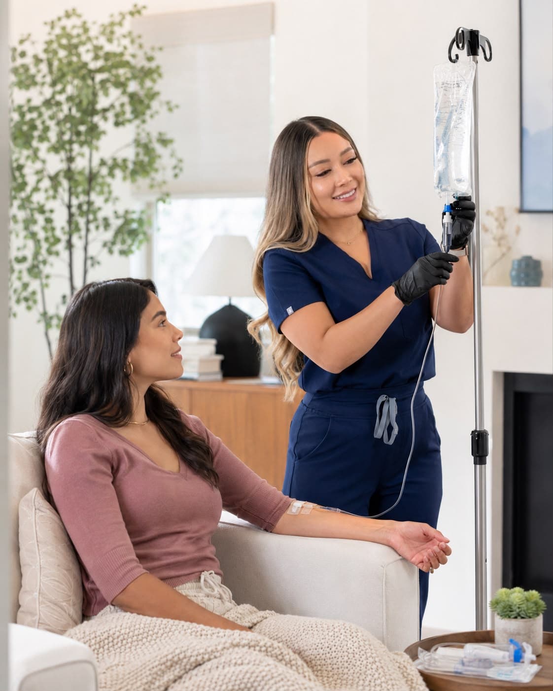 Elivation Health registered nurse providing mobile IV therapy in a home setting